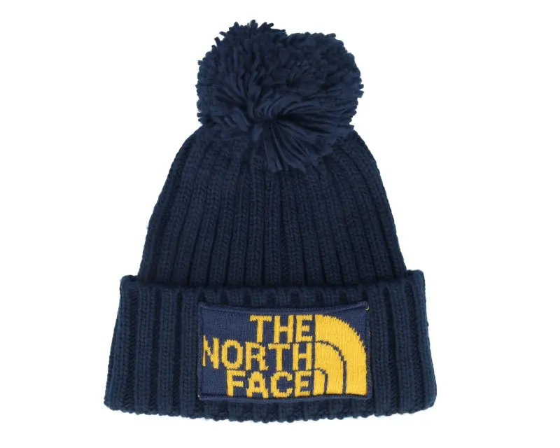 The North Face Heritage Ski Tuke Navy/Gold Pom online